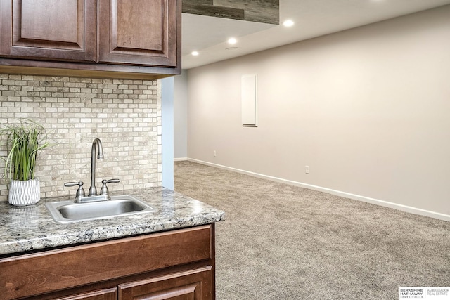 21305 Mcclellan Cir, Gretna, NE 68028 - kitchen with carpet, recessed lighting, and dark brown cabinetry