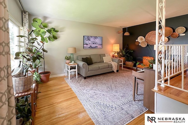 8506 Keystone Dr, Omaha, NE 68134 - living area with wood finished floors and baseboards