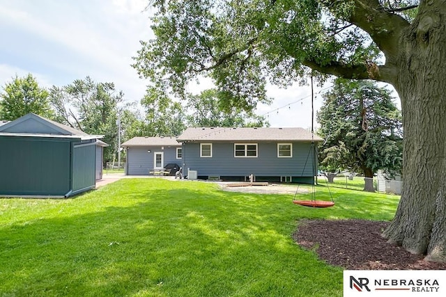 8506 Keystone Dr, Omaha, NE 68134 - back of property featuring an outbuilding