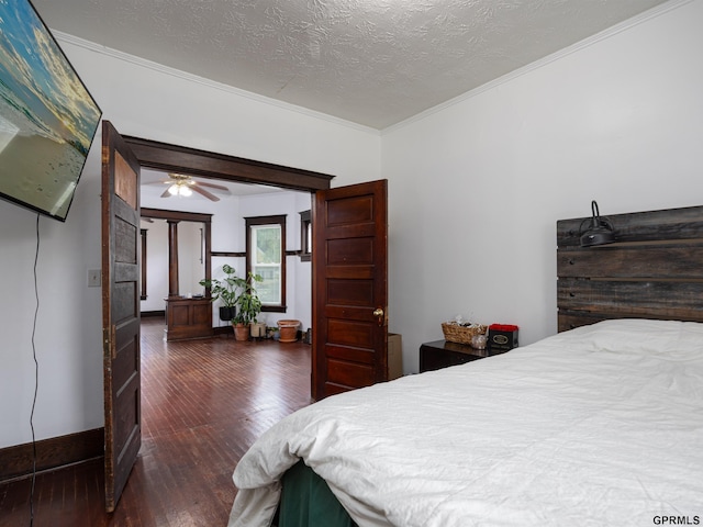 6557 Maple St, Omaha, NE 68104 - bedroom with hardwood / wood-style flooring, ornamental molding, and a textured ceiling