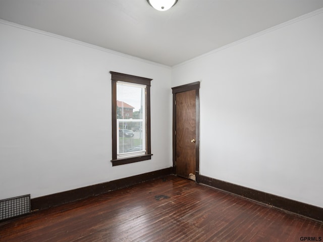 6557 Maple St, Omaha, NE 68104 - spare room with dark wood-type flooring and crown molding