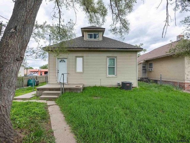 6557 Maple St, Omaha, NE 68104 - back of house with a shingled roof