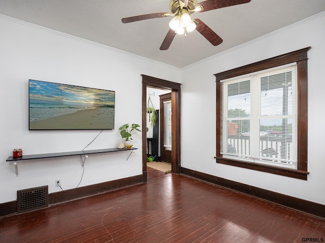 6557 Maple St, Omaha, NE 68104 - unfurnished living room featuring hardwood / wood-style floors, a ceiling fan, and ornamental molding