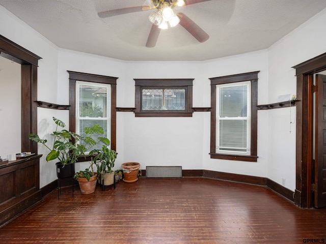 6557 Maple St, Omaha, NE 68104 - unfurnished room with wood-type flooring, a ceiling fan, and crown molding