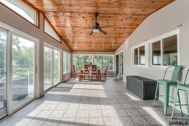 1524 Trumball Ter, Plattsmouth, NE 68048 - unfurnished sunroom featuring wooden ceiling, vaulted ceiling, and tile patterned floors