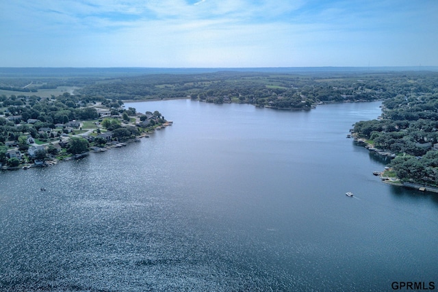 1524 Trumball Ter, Plattsmouth, NE 68048 - drone / aerial view of a nearby body of water and a heavily wooded area