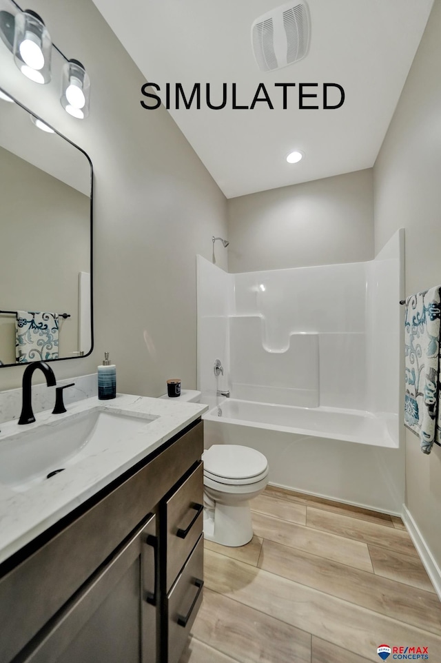 527 N 108th St, Lincoln, NE 68527 - bathroom with vanity, tub / shower combination, and wood finished floors