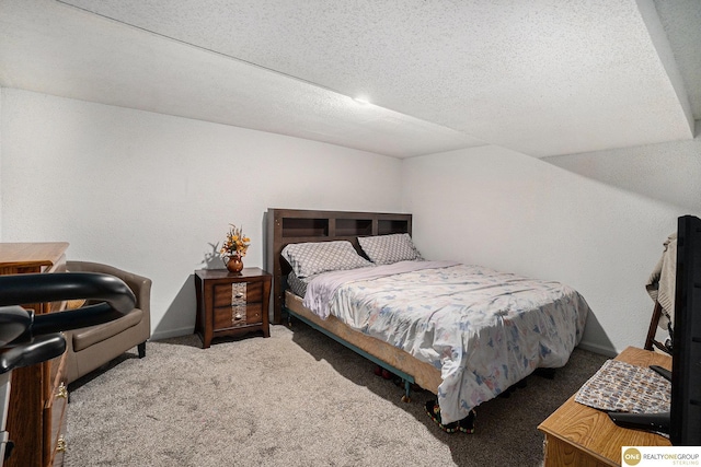 4615 N 28th Ave, Omaha, NE 68111 - carpeted bedroom with baseboards and a textured ceiling