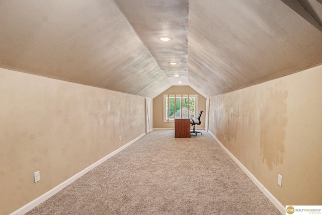 4615 N 28th Ave, Omaha, NE 68111 - additional living space with vaulted ceiling, carpet floors, recessed lighting, and an office area