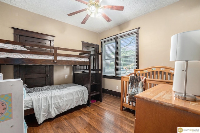 4615 N 28th Ave, Omaha, NE 68111 - bedroom with wood-type flooring and a textured ceiling