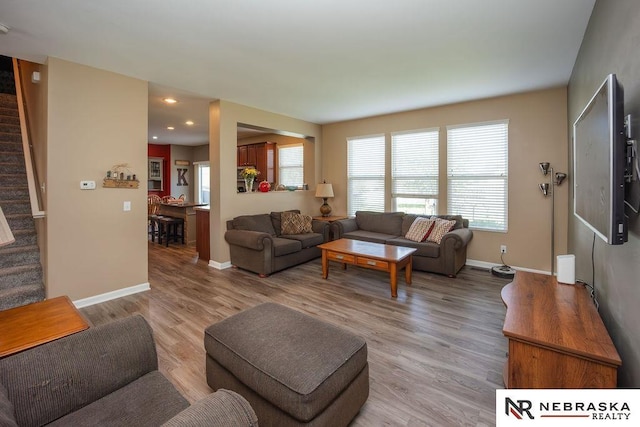 15929 Rosewater Pkwy, Bennington, NE 68007 - living area with stairs, light wood-type flooring, and recessed lighting