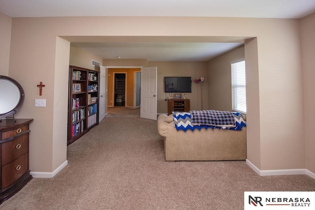 15929 Rosewater Pkwy, Bennington, NE 68007 - living room with carpet flooring and baseboards