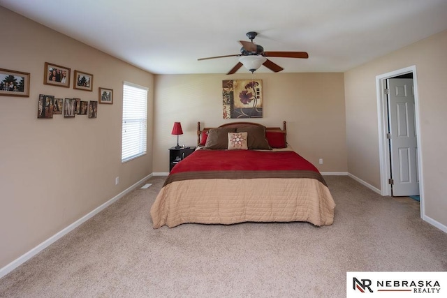 15929 Rosewater Pkwy, Bennington, NE 68007 - carpeted bedroom featuring baseboards and ceiling fan