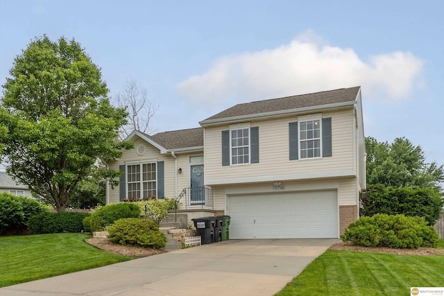 15748 Rosewood St, Omaha, NE 68136 - tri-level home featuring a garage, driveway, and a front lawn