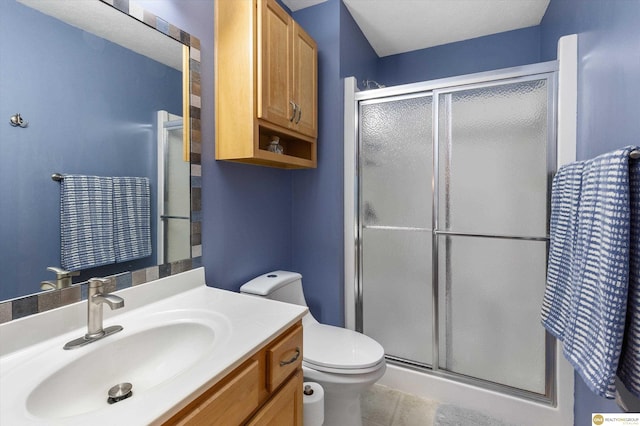 15748 Rosewood St, Omaha, NE 68136 - bathroom featuring vanity, a stall shower, and tile patterned floors