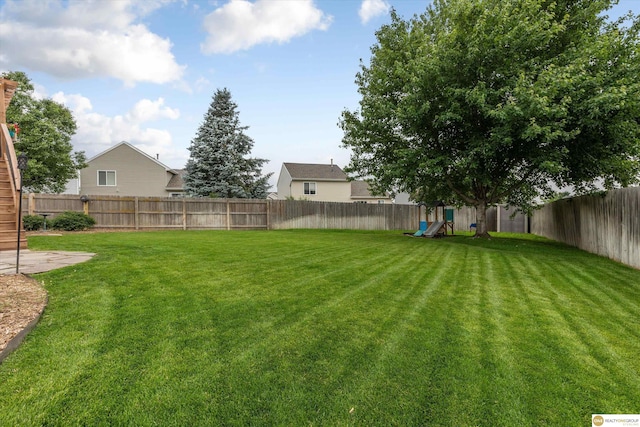 15748 Rosewood St, Omaha, NE 68136 - fenced backyard with a playground