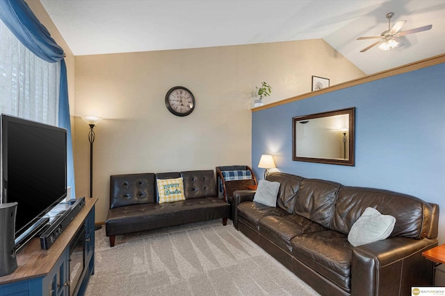 15748 Rosewood St, Omaha, NE 68136 - living area featuring vaulted ceiling, carpet floors, and a ceiling fan
