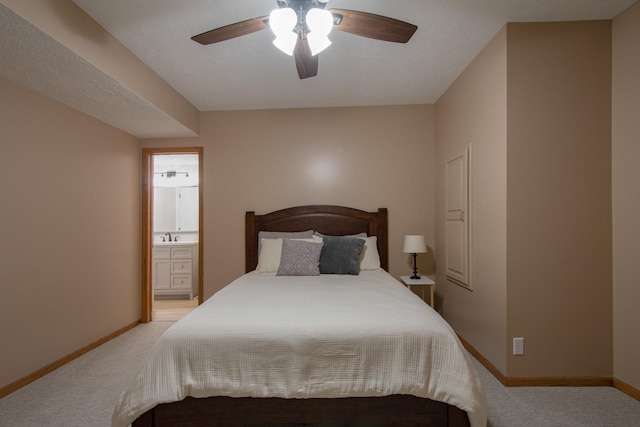 17139 S St, Omaha, NE 68135 - bedroom featuring light colored carpet, ensuite bath, and a ceiling fan
