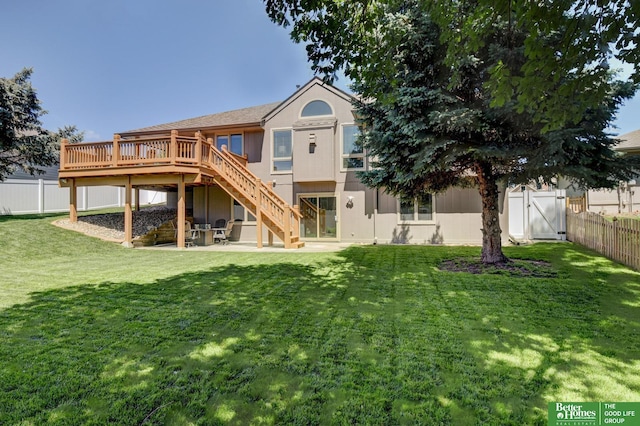 17139 S St, Omaha, NE 68135 - back of property with stairs, a fenced backyard, and a wooden deck