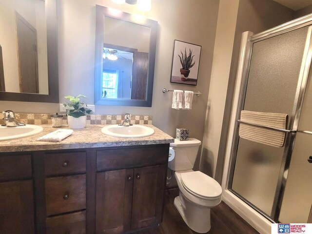 2364 N Columbia Ave, Seward, NE 68434 - full bath featuring double vanity, a shower stall, and ceiling fan