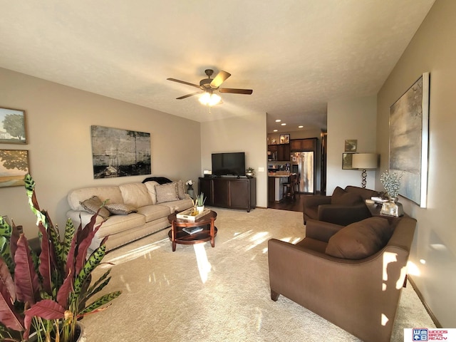 2364 N Columbia Ave, Seward, NE 68434 - living area with a ceiling fan and light carpet