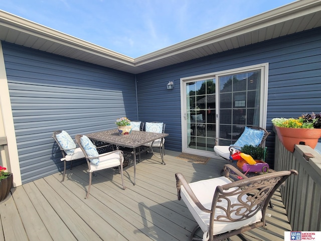 2364 N Columbia Ave, Seward, NE 68434 - wooden terrace featuring outdoor dining area