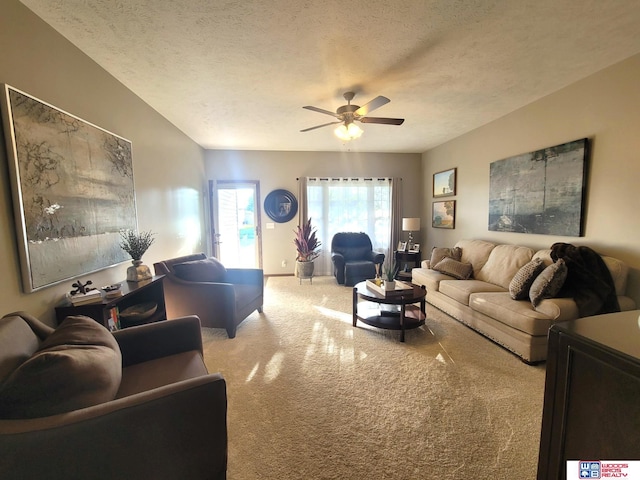 2364 N Columbia Ave, Seward, NE 68434 - carpeted living area featuring ceiling fan and a textured ceiling