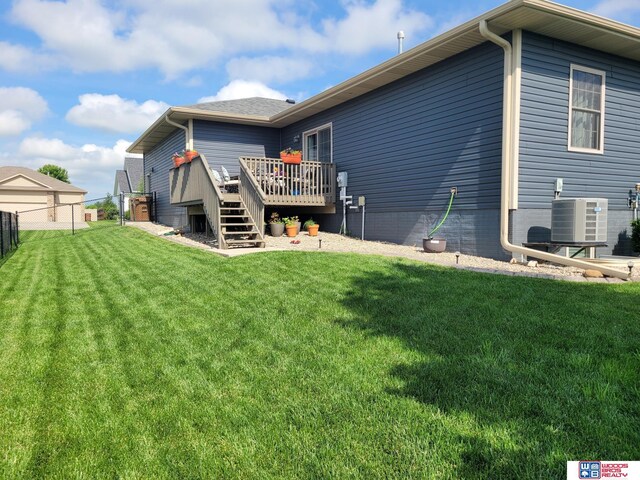 2364 N Columbia Ave, Seward, NE 68434 - rear view of property featuring a deck and stairway