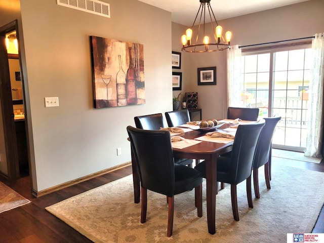 2364 N Columbia Ave, Seward, NE 68434 - dining room featuring a chandelier and wood finished floors