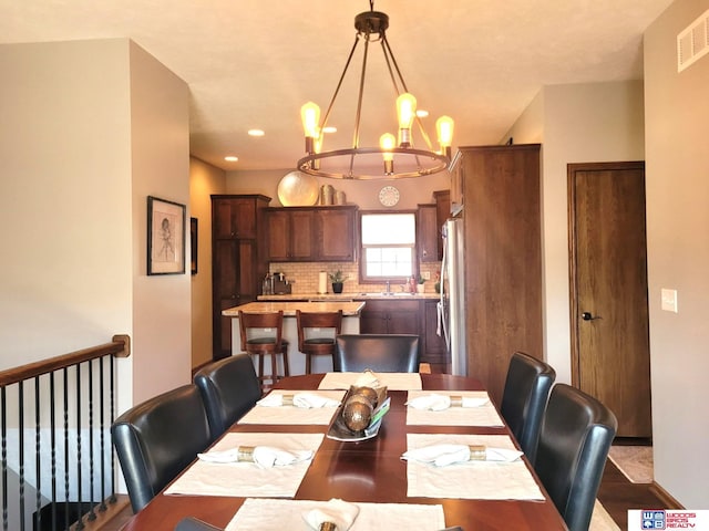 2364 N Columbia Ave, Seward, NE 68434 - dining area featuring a chandelier and recessed lighting