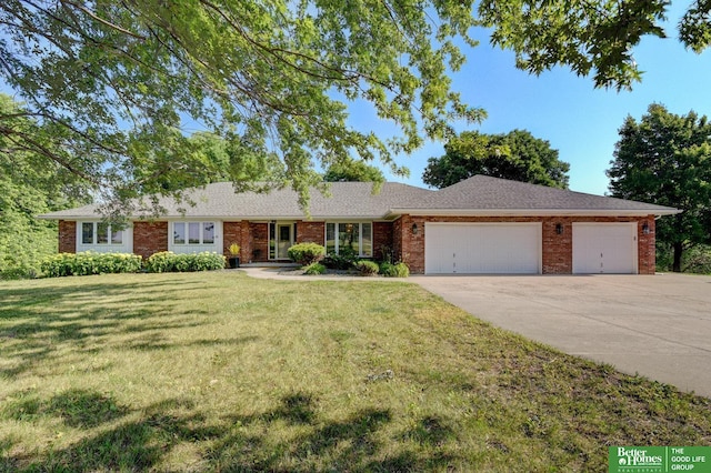 21900 Angus Rd, Gretna, NE 68028 - ranch-style home featuring a garage, driveway, a front lawn, and brick siding