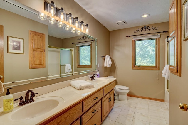 21900 Angus Rd, Gretna, NE 68028 - bathroom with an enclosed shower, double vanity, tile patterned floors, and a bathtub
