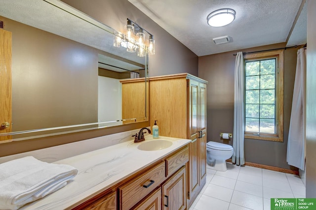 21900 Angus Rd, Gretna, NE 68028 - bathroom with vanity, a textured ceiling, and tile patterned flooring