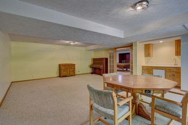 21900 Angus Rd, Gretna, NE 68028 - dining area featuring a textured ceiling, wet bar, and light colored carpet