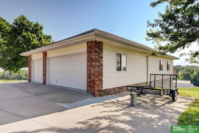 21900 Angus Rd, Gretna, NE 68028 - view of side of home with concrete driveway