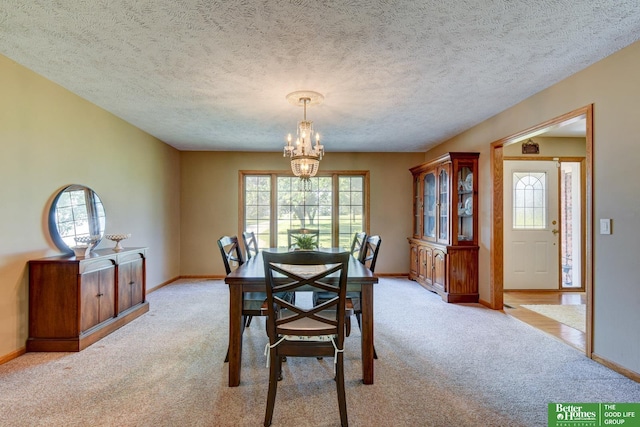 21900 Angus Rd, Gretna, NE 68028 - dining area featuring a chandelier and light carpet
