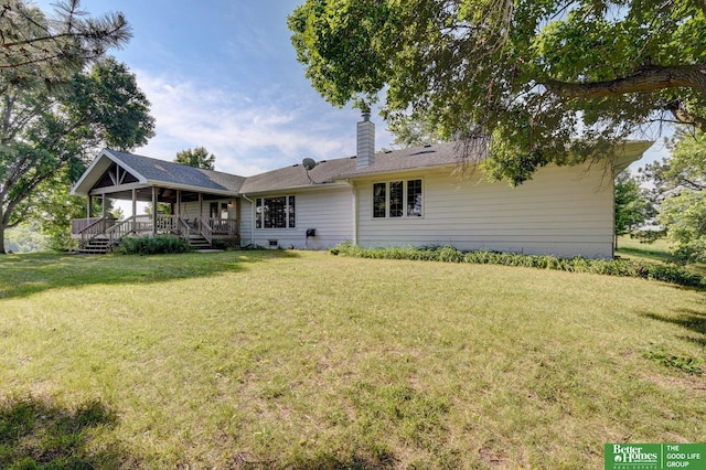 21900 Angus Rd, Gretna, NE 68028 - rear view of house with a lawn and a chimney