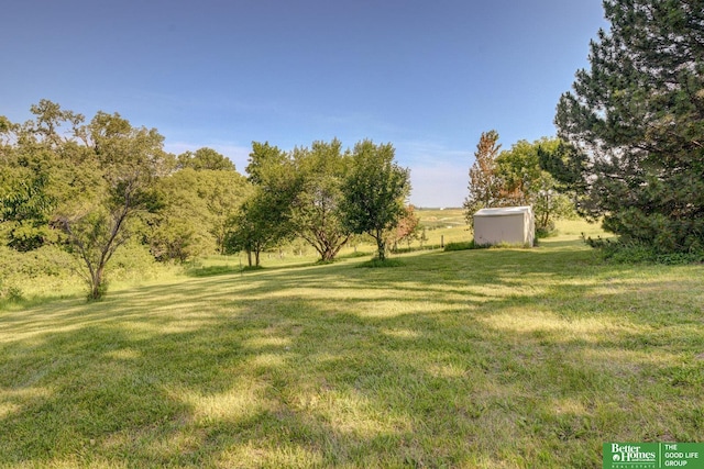 21900 Angus Rd, Gretna, NE 68028 - view of green lawn featuring a shed