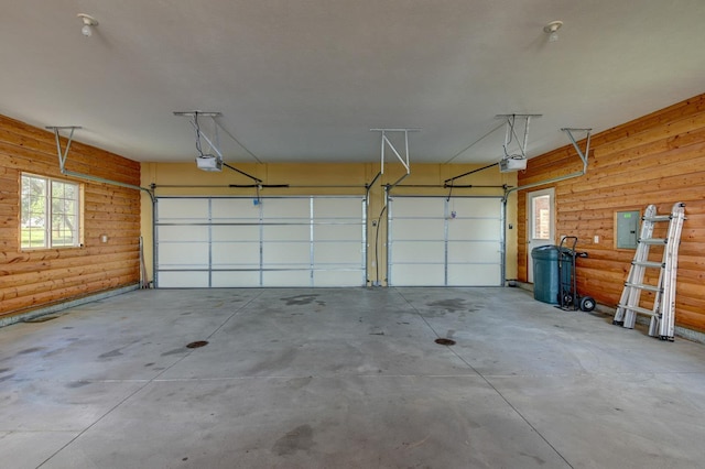21900 Angus Rd, Gretna, NE 68028 - garage featuring electric panel and a garage door opener