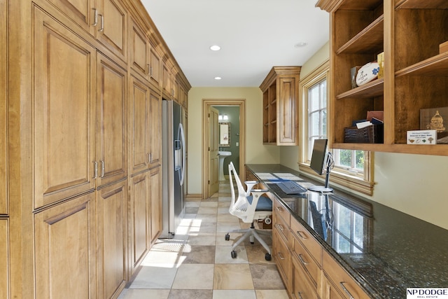1705 N 102nd St, Omaha, NE 68114 - home office with built in desk, recessed lighting, and light tile patterned floors