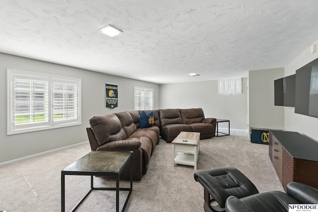 1705 N 102nd St, Omaha, NE 68114 - living room featuring a textured ceiling and carpet