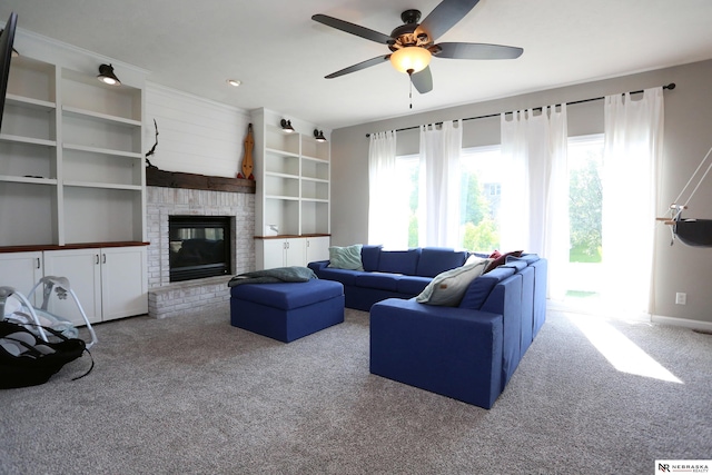 11915 S 53rd St, Papillion, NE 68133 - carpeted living room with ceiling fan, a brick fireplace, and built in shelves