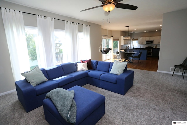11915 S 53rd St, Papillion, NE 68133 - living room featuring dark colored carpet, a ceiling fan, and recessed lighting