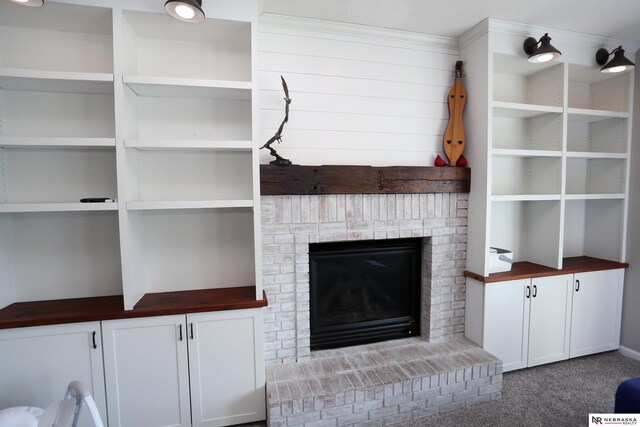 11915 S 53rd St, Papillion, NE 68133 - unfurnished living room featuring a brick fireplace and carpet