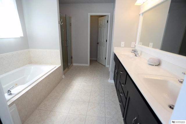 11915 S 53rd St, Papillion, NE 68133 - bathroom with double vanity, a whirlpool tub, a stall shower, and tile patterned floors