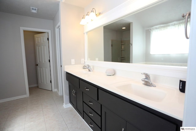11915 S 53rd St, Papillion, NE 68133 - bathroom with double vanity, tile patterned floors, and a shower