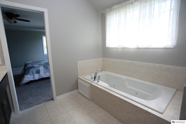 11915 S 53rd St, Papillion, NE 68133 - bathroom featuring a whirlpool tub, ensuite bath, tile patterned floors, a ceiling fan, and vanity