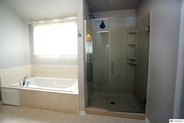 11915 S 53rd St, Papillion, NE 68133 - bathroom with a stall shower, a bath, and tile patterned flooring
