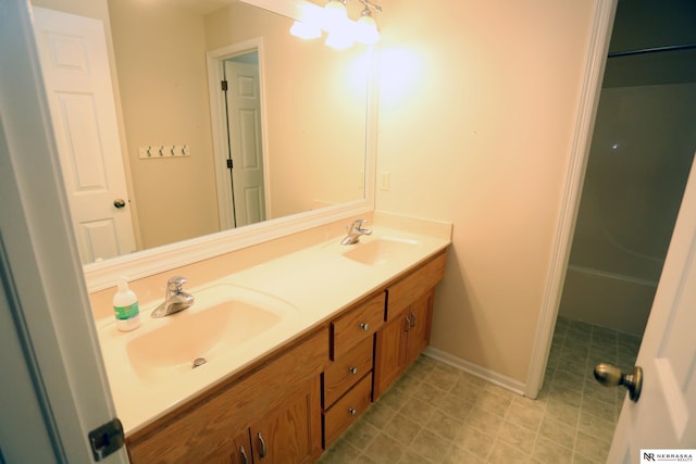 11915 S 53rd St, Papillion, NE 68133 - full bathroom with double vanity and a chandelier
