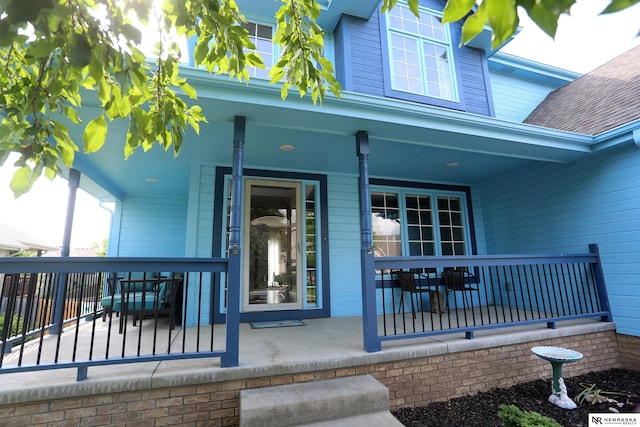 11915 S 53rd St, Papillion, NE 68133 - entrance to property with a porch and a shingled roof